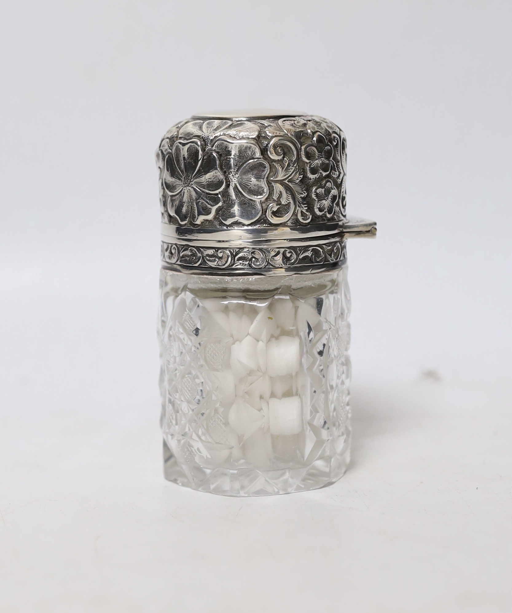 Four silver mustard ladles, including two 19th century, two plated ladles and an Edwardian silver mounted glass salts jar, London, 1905, 94mm.